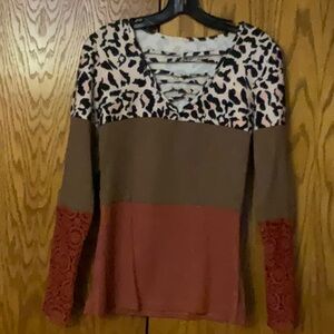 Brand new. Never worn  3 design print